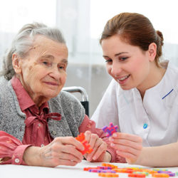 caregiver woman keeping company to a senior lady