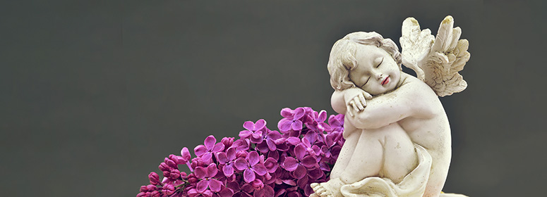 angel statue with flowers